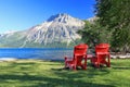 Canadian Rocky Mountains Landscape with Red Parks Canada Adirondack Chairs, Waterton Lakes National Park, Alberta