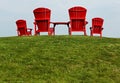 Red Adirondack Muskoka Chairs Royalty Free Stock Photo