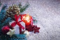 Red Advent candle and Christmas decoration. Christmas card . Royalty Free Stock Photo