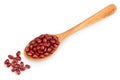 Red adzuki beans in wooden spoon isolated on white background. Top view. Flat lay. Royalty Free Stock Photo
