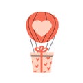 red aero baloon with gift- heart love pattern Royalty Free Stock Photo