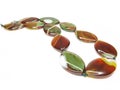 Red agate beads with green spots Royalty Free Stock Photo