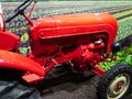 Red agricultural tractor at the exhibition