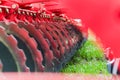 Red agriculture machine harrow details close up Royalty Free Stock Photo