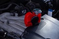 Red air horn for a car on a car engine. Electric Car air horn Royalty Free Stock Photo