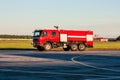 Red airfield fire truck at the airport