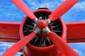 Red airplane biplane with piston engine