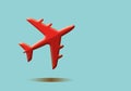 Red airplane flying in the sky background. Travel by air transport concept. Royalty Free Stock Photo