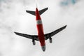 Red airplane low angle view Royalty Free Stock Photo