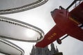 Red airplane in Tibidabo Amusement Park in Barcelona, against a clear sky