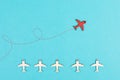 Red airplanes takes a different direction, leadership and business concept, follow your dreams, motivation and coaching , positive Royalty Free Stock Photo