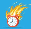 Red alarm clock in fire. Burning clock. Royalty Free Stock Photo