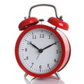 Red alarm clock isolated on white Royalty Free Stock Photo