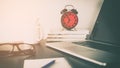 Red Alarm Clock on office table objects Royalty Free Stock Photo