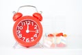 Red alarm clock and pill box Royalty Free Stock Photo