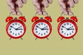 Red alarm clocks setting backwards or forwards Royalty Free Stock Photo