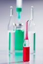 Red ampula and syringe still life Royalty Free Stock Photo