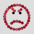 The red angry smilie from smalt Royalty Free Stock Photo