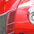 Red antique car extreme closeup Royalty Free Stock Photo