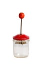 Red Antique Nut Chopper on Glass Measuring Jar