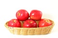 Red apple in bamboo basket on white background Royalty Free Stock Photo