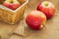 Red apple and basket, filtered image Royalty Free Stock Photo