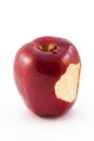 Red apple with a biten taken Royalty Free Stock Photo