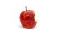 Red Apple bitten off eaten on a white background, core Royalty Free Stock Photo