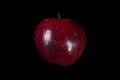 Red apple on black background Royalty Free Stock Photo