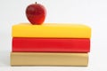Red Apple with Books in a Stack Royalty Free Stock Photo