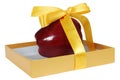 Red apple in box with yellow tape like gift Royalty Free Stock Photo