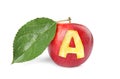 Red apple with carved letter A as school grade on white background Royalty Free Stock Photo