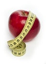 Red apple and centimeter Royalty Free Stock Photo