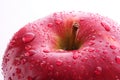 Red apple closeup with waterdrops isolated Royalty Free Stock Photo