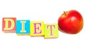 Red apple and cubes with letters - diet Royalty Free Stock Photo