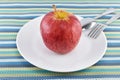 Red apple on dish concept for healthy diet and body weight con Royalty Free Stock Photo