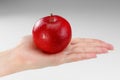 Red apple on a female palm Royalty Free Stock Photo