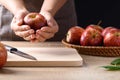 Red apple fruit with hand prepare for cooking