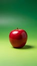 Red Apple on Green Background with Shadow Royalty Free Stock Photo