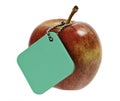 Red apple with green tag Royalty Free Stock Photo