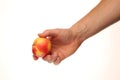 Red apple in hand on a white background isolate Royalty Free Stock Photo