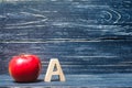 Red apple and letter A. The concept of primary education. Apple Royalty Free Stock Photo