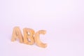 Red apple and letters ABC on a white background. The concept of Royalty Free Stock Photo