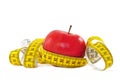 Red apple and measure tape Royalty Free Stock Photo