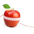 Red apple and measure tape Royalty Free Stock Photo