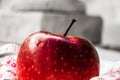 Red apple with measurig tape, weigh loss concept monochrome and red Royalty Free Stock Photo