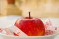 Red apple with measurig tape, weigh loss concept Royalty Free Stock Photo
