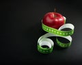 Red Apple and Measuring Tape, Health Diet Food, Weight Loss Concept Royalty Free Stock Photo