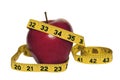 Red apple with measuring tape Royalty Free Stock Photo