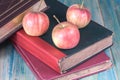 Red apple on old book Royalty Free Stock Photo